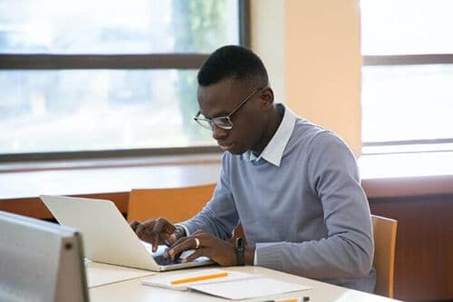 Professional working at a laptop